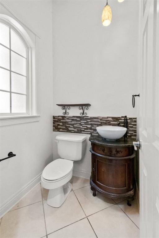 2306 SW Clover Ct, Bentonville, AR 72712 - bathroom with toilet, tile patterned flooring, and vanity