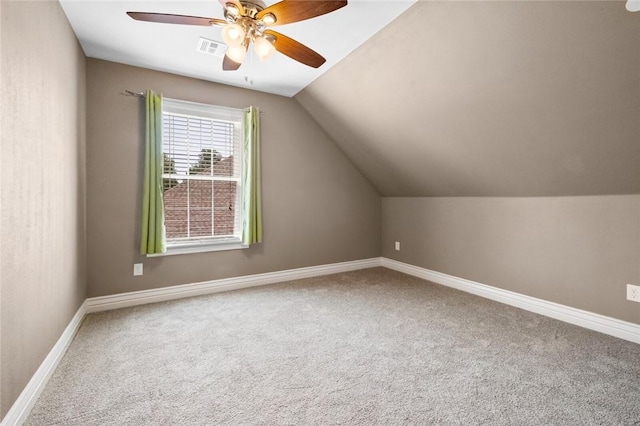 2306 SW Clover Ct, Bentonville, AR 72712 - bonus room with lofted ceiling, visible vents, carpet floors, a ceiling fan, and baseboards
