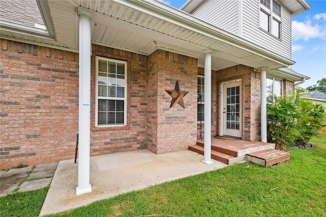 2306 SW Clover Ct, Bentonville, AR 72712 - entrance to property with a yard and brick siding