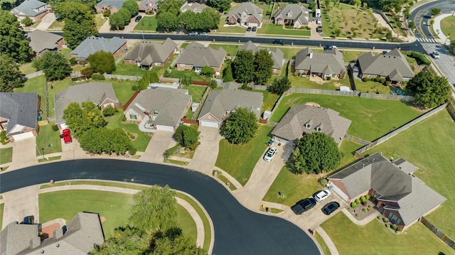 birds eye view of property with a residential view