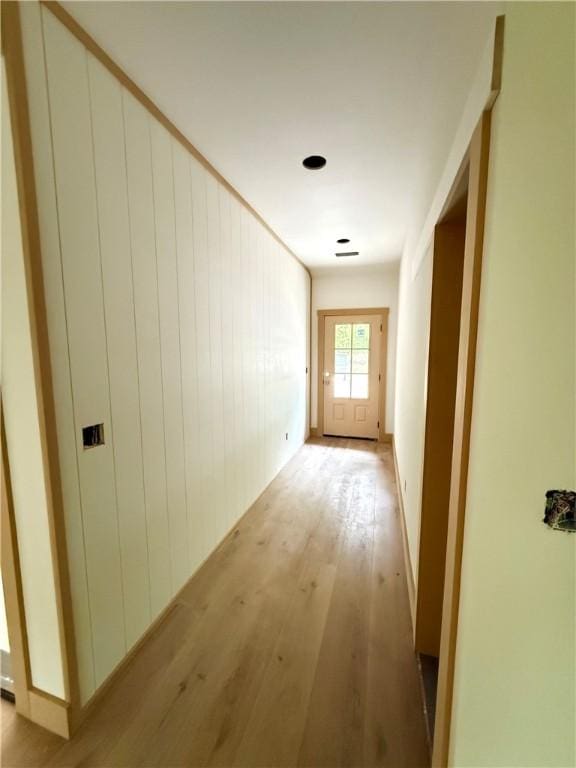 hallway with light wood finished floors