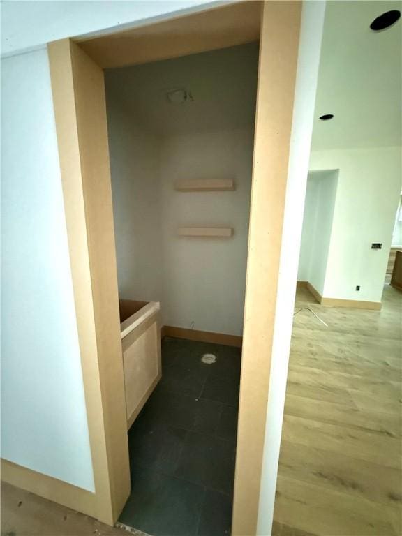bathroom featuring baseboards
