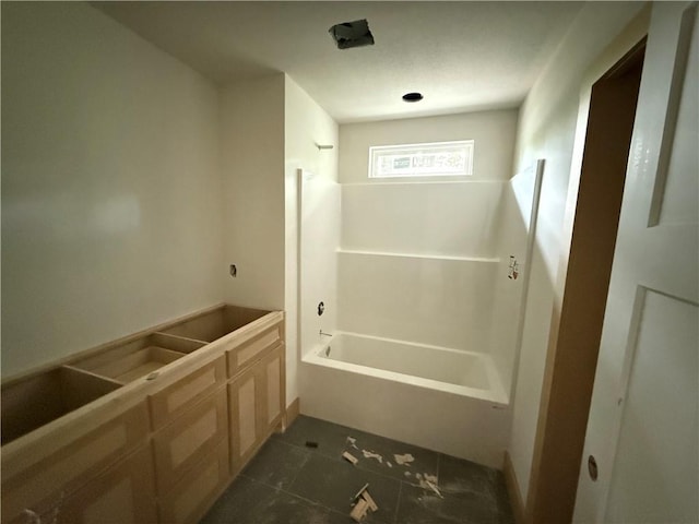 bathroom with tile patterned floors and bathing tub / shower combination