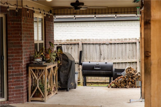view of patio featuring a ceiling fan and area for grilling