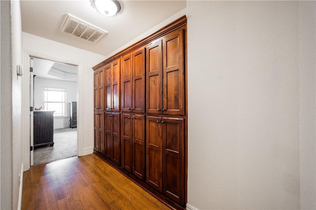 2915 N 15th Pl, Rogers, AR 72756 - corridor with dark wood-style flooring and baseboards