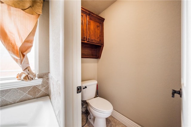 bathroom featuring toilet