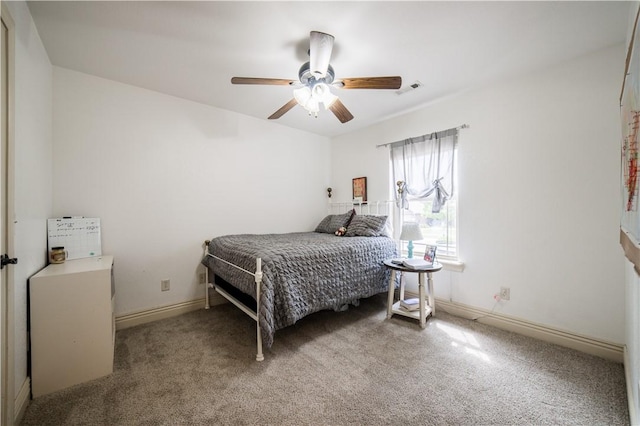 2915 N 15th Pl, Rogers, AR 72756 - carpeted bedroom with ceiling fan and baseboards