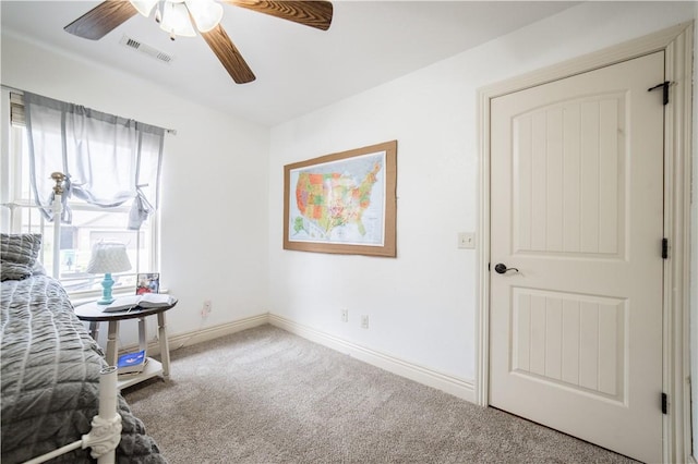 bedroom with visible vents, carpet, ceiling fan, and baseboards