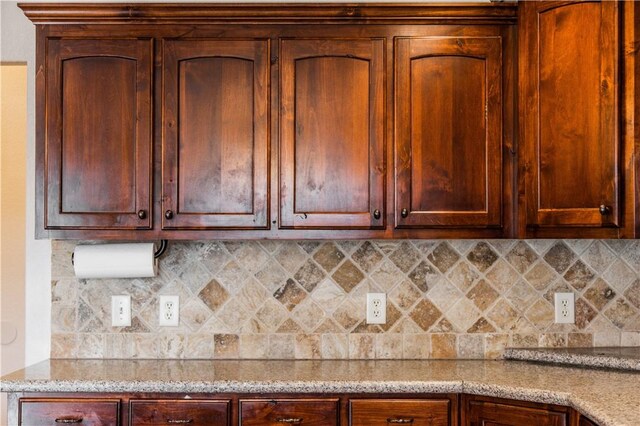 2915 N 15th Pl, Rogers, AR 72756 - kitchen with decorative backsplash and light stone countertops