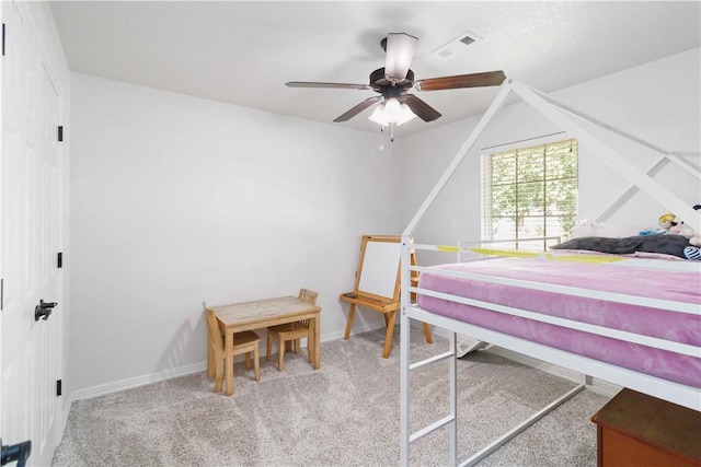 carpeted bedroom with baseboards, ceiling fan, and visible vents
