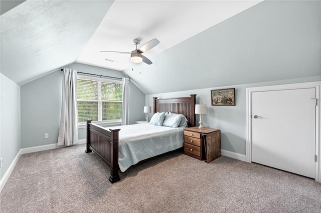carpeted bedroom featuring baseboards, ceiling fan, visible vents, and lofted ceiling