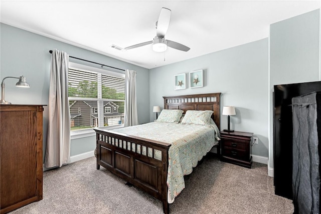 bedroom with baseboards, carpet, and visible vents