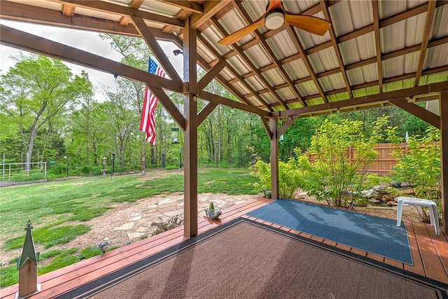 view of patio with a gazebo, ceiling fan, and fence