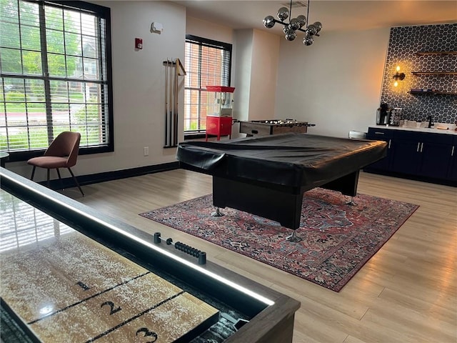 4261 Meadow Creek Cir Unit 204, Fayetteville, AR 72703 - recreation room featuring light wood-type flooring, indoor wet bar, a sink, and pool table