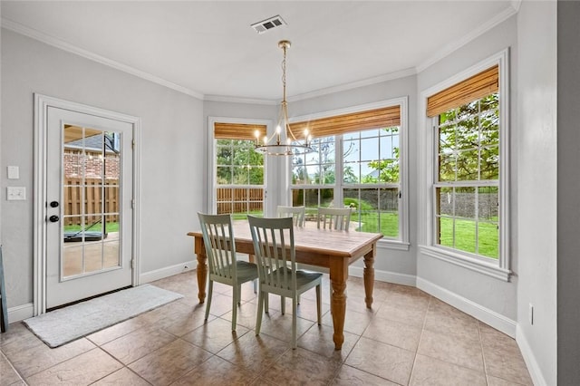 tiled dining area featuring crown molding, a notable chandelier, visible vents, and baseboards