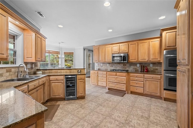 kitchen with crown molding, tasteful backsplash, a sink, beverage cooler, and stainless steel appliances