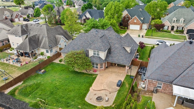 birds eye view of property with a residential view