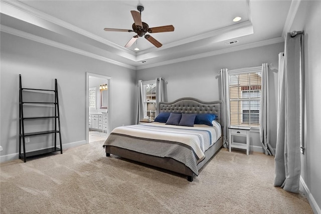 bedroom with recessed lighting, a tray ceiling, visible vents, and light carpet