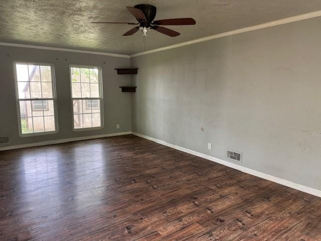 unfurnished room with a ceiling fan, visible vents, ornamental molding, and dark wood-type flooring