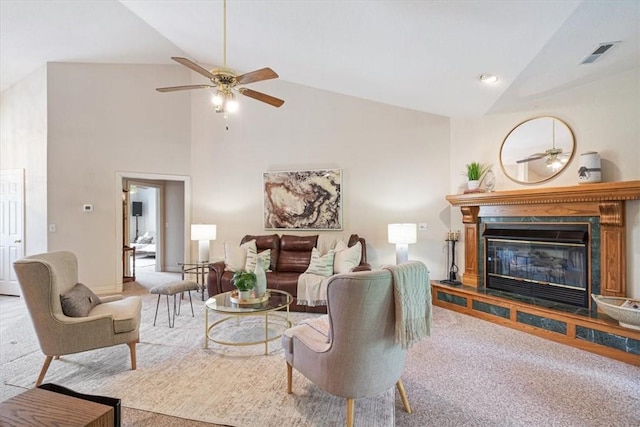 2 Breton Ln, Bella Vista, AR 72715 - carpeted living area featuring ceiling fan, high vaulted ceiling, and a glass covered fireplace