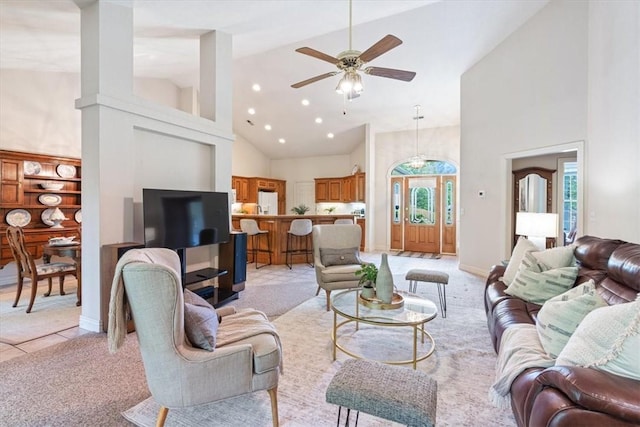 2 Breton Ln, Bella Vista, AR 72715 - living area featuring high vaulted ceiling, light carpet, a ceiling fan, and recessed lighting