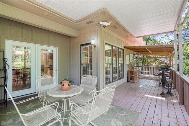 2 Breton Ln, Bella Vista, AR 72715 - wooden deck featuring outdoor dining space