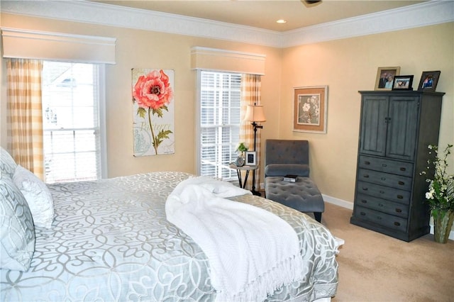 bedroom with baseboards, light colored carpet, and ornamental molding