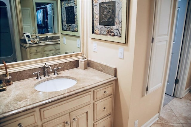 bathroom featuring vanity and tile patterned flooring