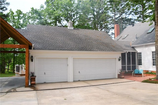 garage featuring driveway