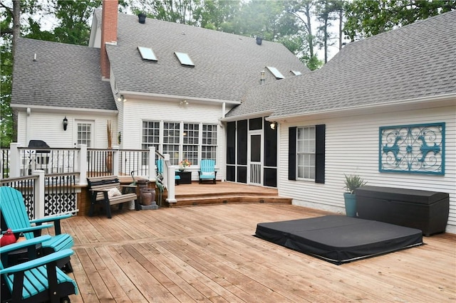 deck featuring a sunroom
