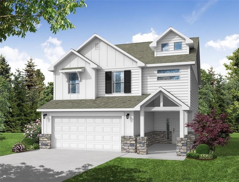 craftsman-style home with roof with shingles, concrete driveway, and a front yard