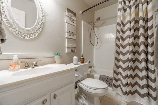 full bathroom featuring vanity, tile patterned flooring, shower / bath combo with shower curtain, and toilet