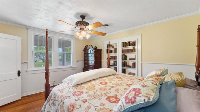 1100 N Lowell Rd, Springdale, AR 72784 - bedroom featuring crown molding, baseboards, and wood finished floors