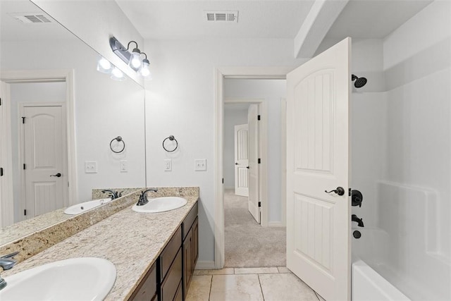 full bath featuring a sink, tub / shower combination, and visible vents