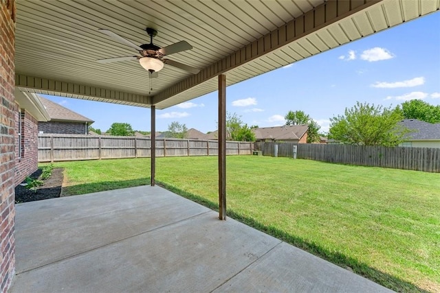 view of patio / terrace featuring a fenced backyard and a ceiling fan