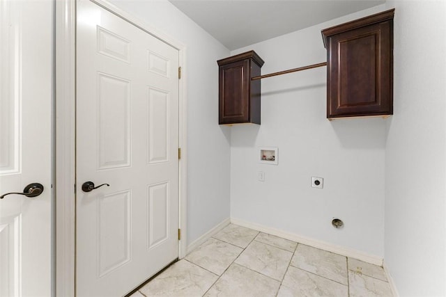 washroom with cabinet space, washer hookup, marble finish floor, baseboards, and electric dryer hookup