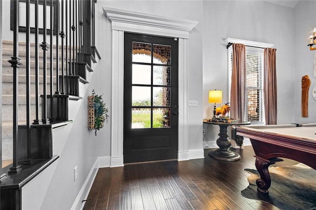 entryway with stairs, pool table, baseboards, and hardwood / wood-style floors