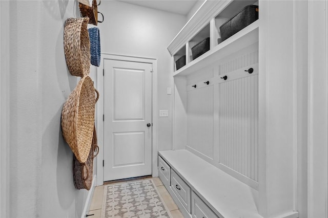 mudroom with light tile patterned floors