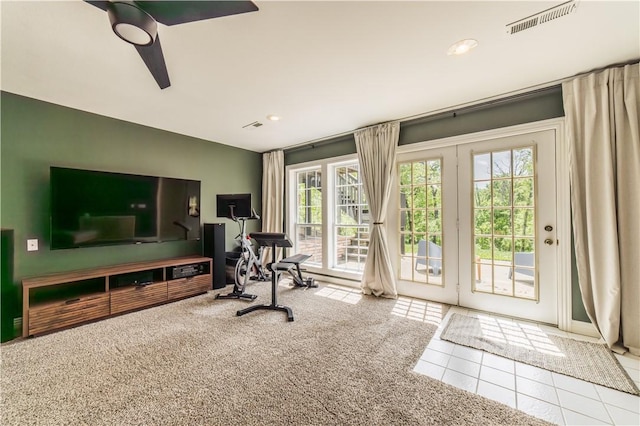 workout area featuring carpet, tile patterned floors, recessed lighting, and ceiling fan