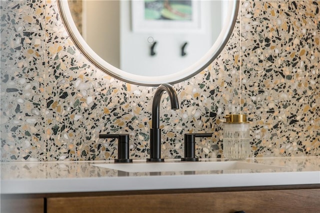 detailed view of tasteful backsplash and a sink