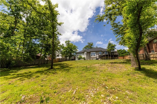 view of yard featuring a wooden deck