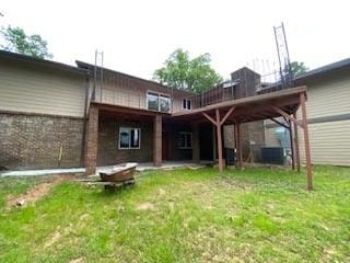6 Briarwood Ln, Clarksville, AR 72830 - rear view of house featuring a lawn