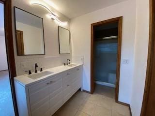 6 Briarwood Ln, Clarksville, AR 72830 - bathroom featuring double vanity and tile patterned flooring