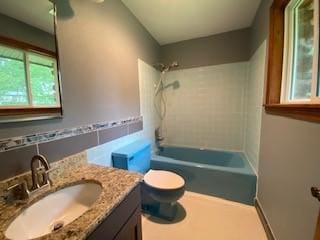 6 Briarwood Ln, Clarksville, AR 72830 - full bath with vanity, toilet, shower / bathtub combination, and tile walls