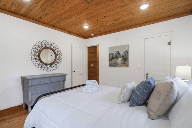 bedroom featuring wooden ceiling, recessed lighting, and wood finished floors