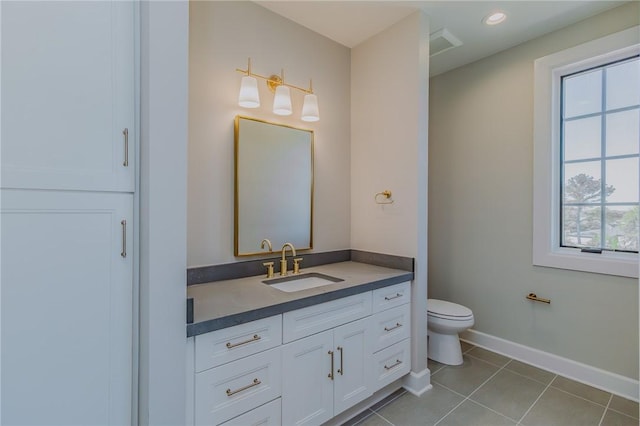 5191 W Pauline Whitaker Pkwy, Rogers, AR 72758 - bathroom with vanity, visible vents, toilet, baseboards, and tile patterned floors