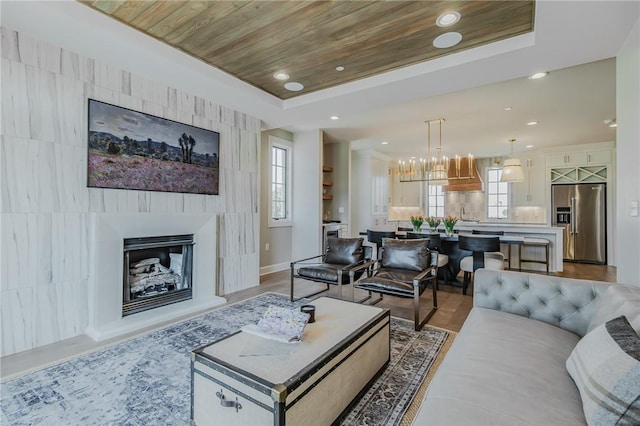 5191 W Pauline Whitaker Pkwy, Rogers, AR 72758 - living room featuring plenty of natural light, a fireplace, and recessed lighting