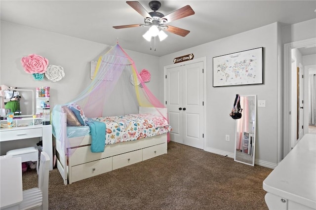 11003 David Ct, Siloam Springs, AR 72761 - carpeted bedroom with a closet, baseboards, and ceiling fan