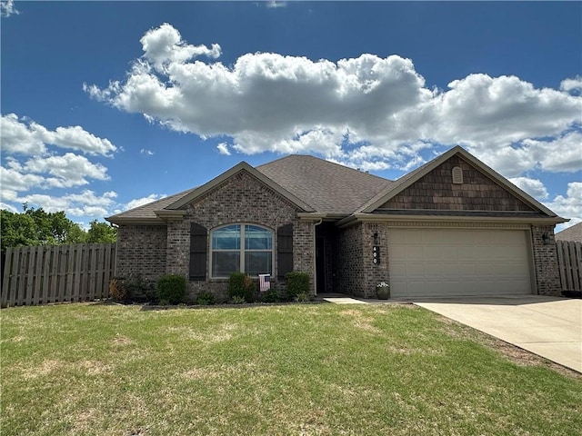 view of front of home with brick siding, driveway, an attached garage, and a shingled roof
