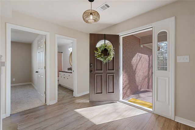 6431 Summer Shade, Van Buren, AR 72956 - entrance foyer with visible vents, light wood-style flooring, plenty of natural light, and baseboards